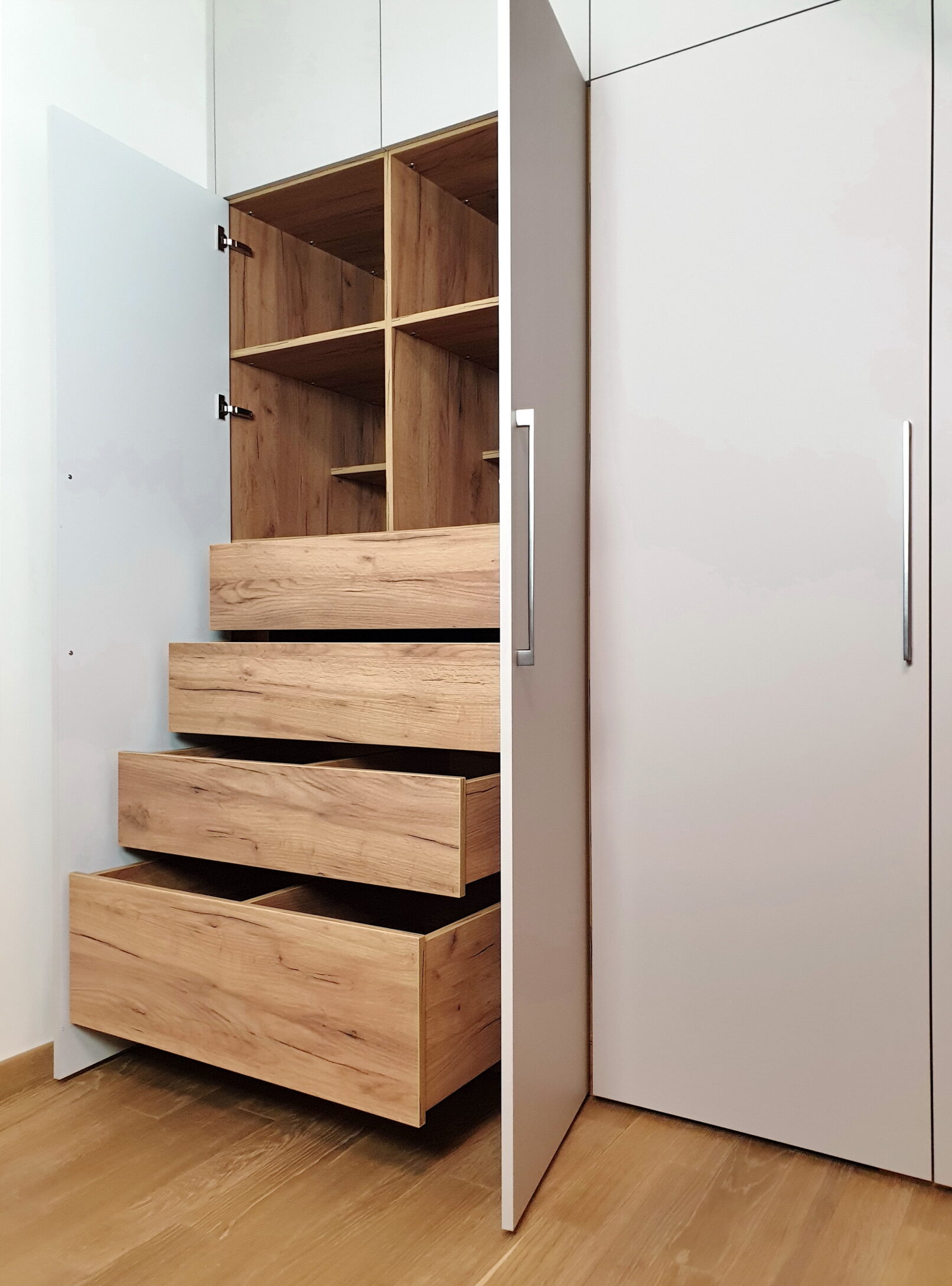 Замовити шафу під сходи